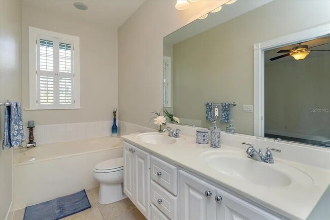 Master bedroom bath with extra large bathtub and shower - 8438 Gilford Ln