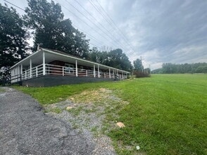 Building Photo - August Only : Submit your application this month and pay a reduced application fee of just $32. 2...
