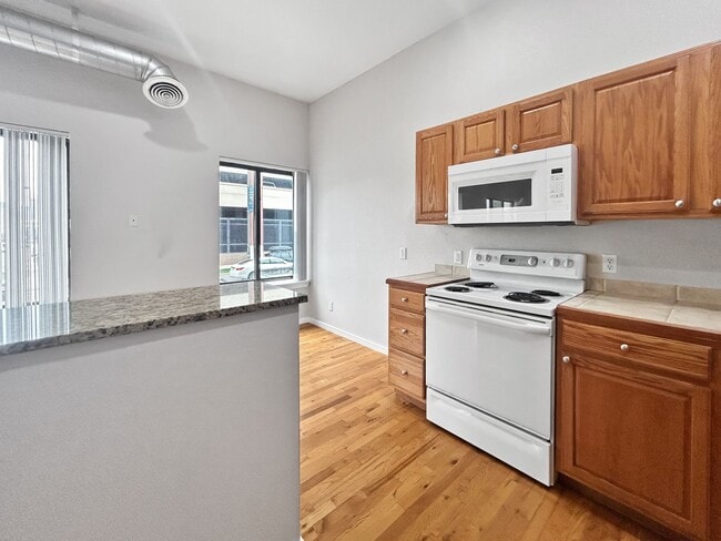 Building Photo - $0 DEPOSIT OPTION. 2 BED 2.5 BATH CONDO AT STUDIO 70 IN DENVER'S GOLDEN TRIANGLE. PARKING INCLUDED!