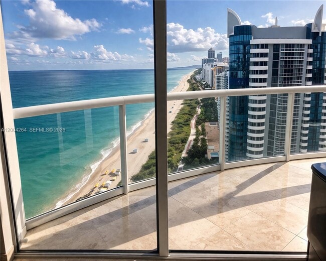 Building Photo - 6365 Collins Ave