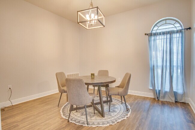 Building Photo - Milton 4BR Pool Home with Office, Vaulted Ceilings, Screened Saltwater Pool & 2-Car Garage