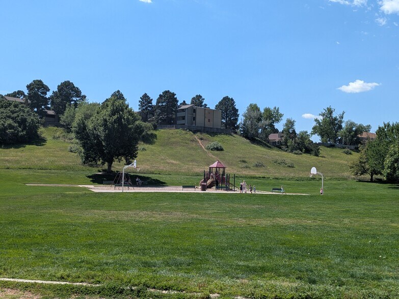 Basketball court and playground across the street. - 3080 Capstan Way