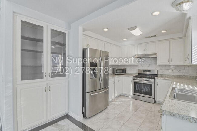 Building Photo - SE!!! 4 Bedrooms!! Master Downstairs!! No Carpet!! Synthetic Grass front and back!!