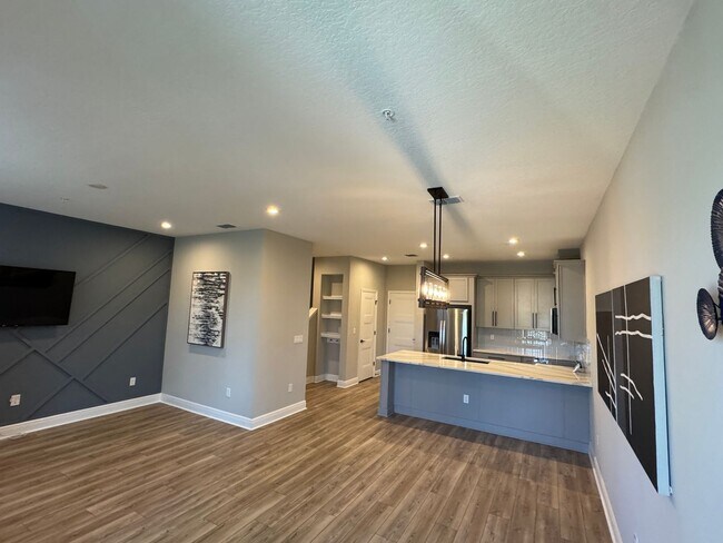 Building Photo - Elegant living in a vibrant, strategically located community—your perfect place to call home.