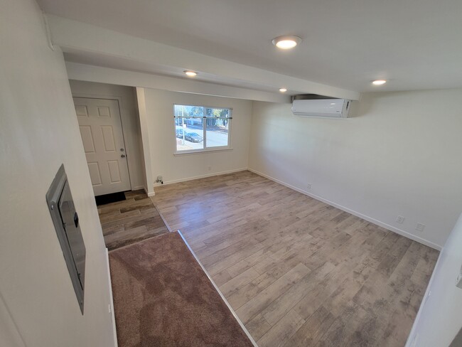 Living Room and air conditioner - 1662 S Grant St