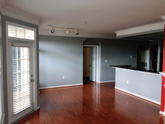 Dining/Living room (Left Door, balcony) (Right door, main bedroom) - 505 Sunset View Terrace SE