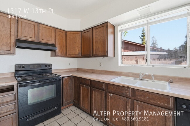 Building Photo - 1317 W 13th Pl