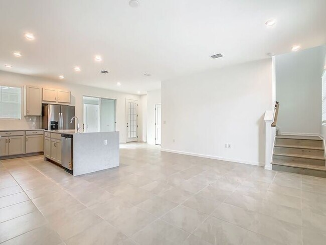 Building Photo - New Luxury Townhome in Celebration with All porcelain tiled floors. Island Village new construction
