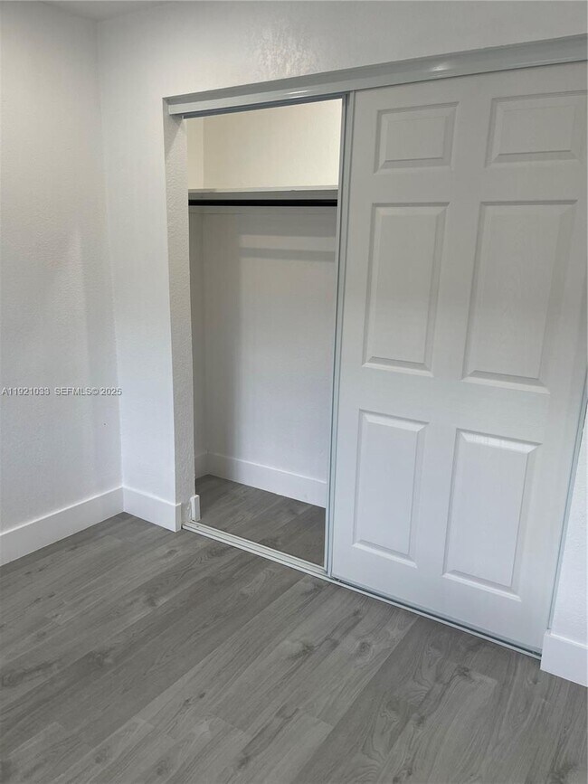 Building Photo - 880 NW 8th Ave