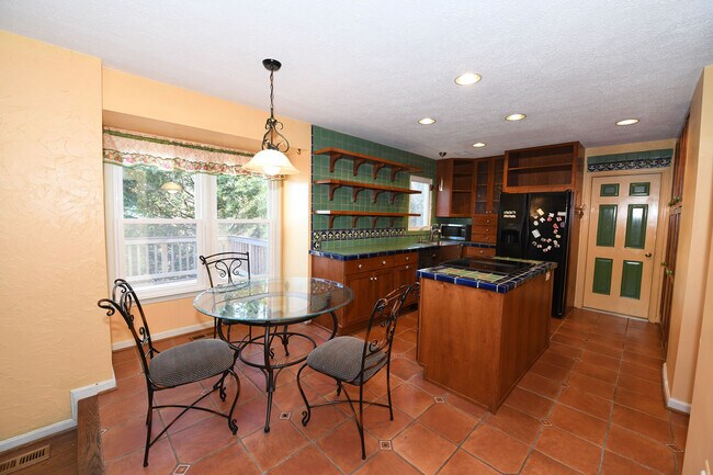 Building Photo - Gorgeous 4 BR 2+2 Baths Colonial - Finished Walk-Out Basement and Car Garage