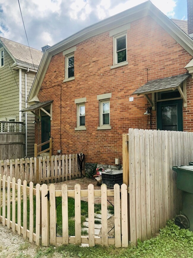 Rear with fenced backyard - 666 S 9th St