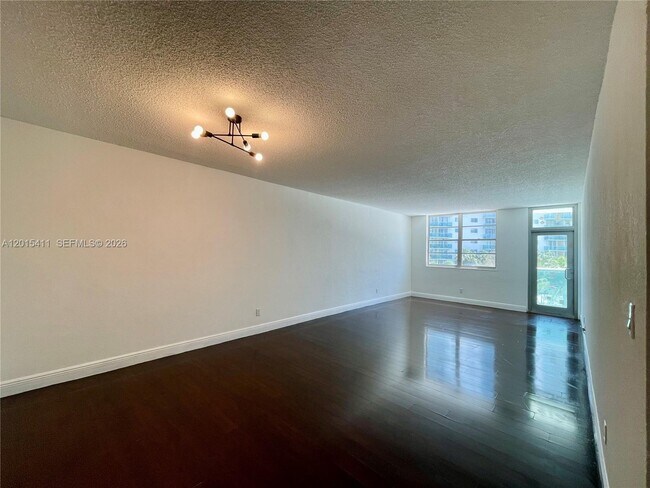 Building Photo - 19390 Collins Ave