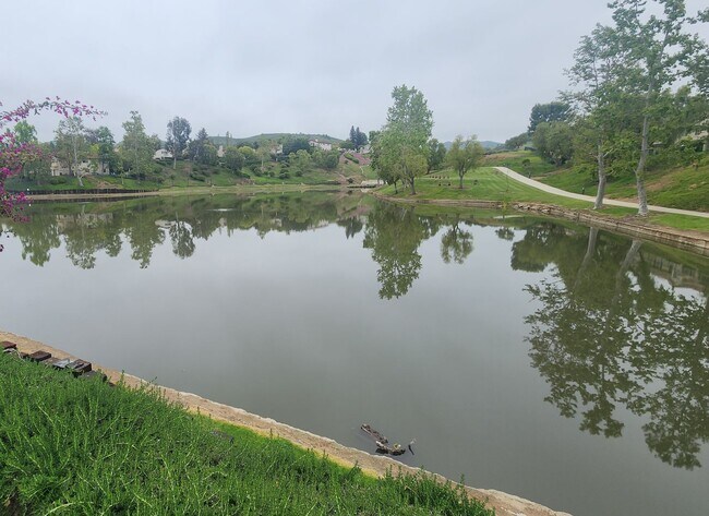 Building Photo - Gorgeous 2 bedroom newly renovated upstairs corner condo in gated community with pool & hill side...