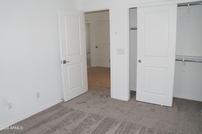 Building Photo - 3809 N 100th Dr