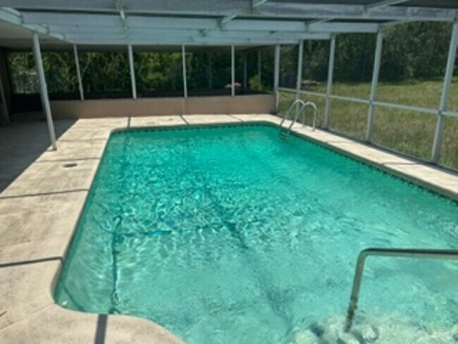 Building Photo - Large  3 bedroom, 2 bath pool home.