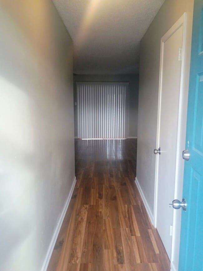 Building Photo - Updated 3/2 Home with 2-Car Garage + Air-Conditioned Workshop!