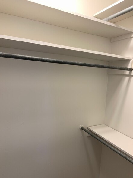 Main closet with 12' of rods - 907A Malquin Dr