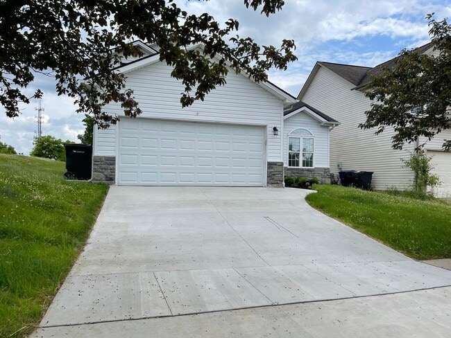 Building Photo - Lovely Single Family House with New Flooring & Paint! 2-Car Garage