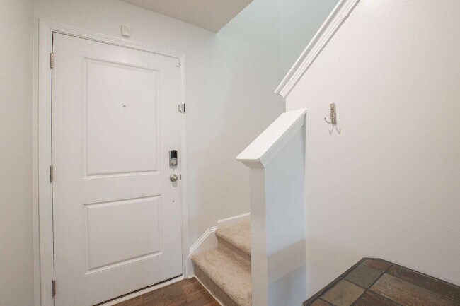 Building Photo - Partially furnished and now available!