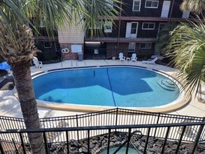 Building Photo - NEW LOWER PRICE  Wonderful 2 Bedroom 1.5 Bathroom condo
