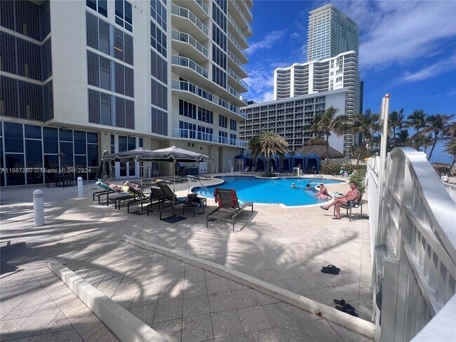 Building Photo - 16699 Collins Ave