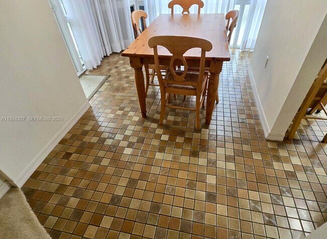 Building Photo - 6423 Collins Ave