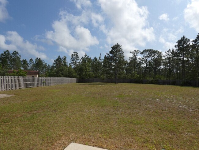 Building Photo - Spacious 3-Bedroom Home - Half Acre Lot