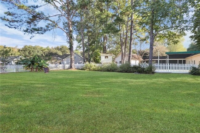 Building Photo - 4-Bedroom Home in Wild Heron with Front Porch and Fenced Yard