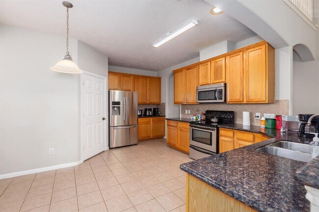 Building Photo - 18714 Racquet Sports Way