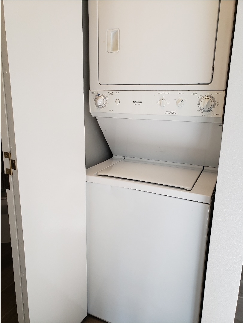 Stackable washer and dryer on the first floor, near the downstairs half bathroom - 625 E 22nd Ave