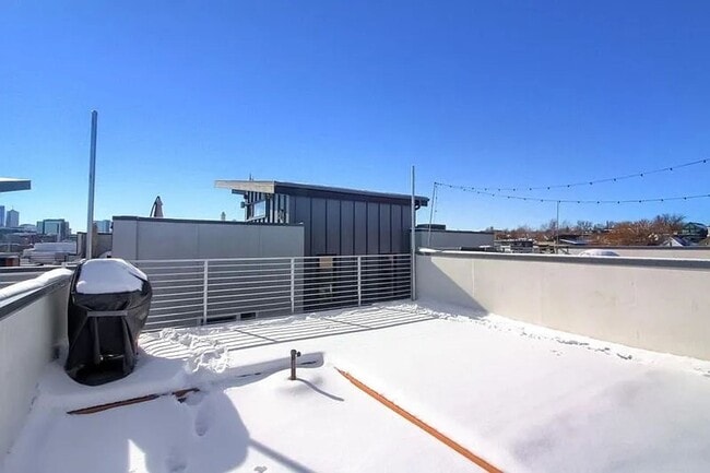 Building Photo - Modern LoHi Living with Rooftop Deck & City Views!!