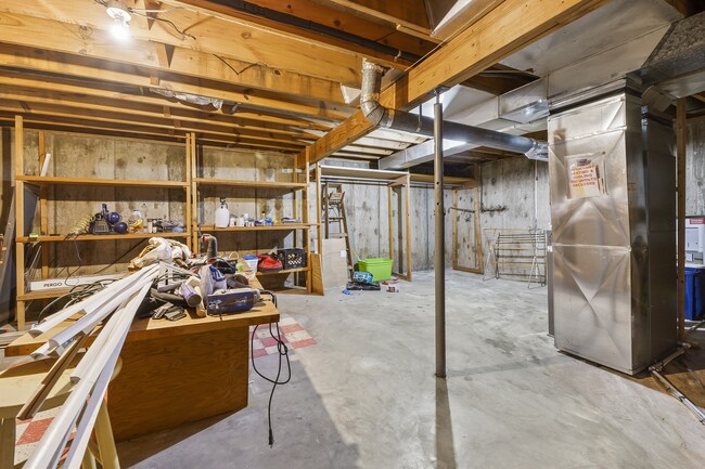 Extra storage space in basement. - 1618 Oak Hills St