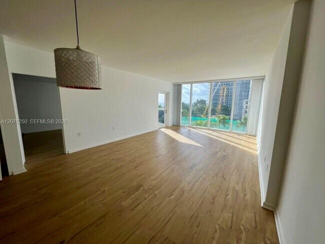 Building Photo - 10275 Collins Ave