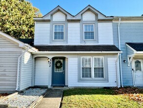 Building Photo - 3-Bedroom Townhome Ready NOW!! Completely Updated - Fenced Backyard - Exterior Storage!