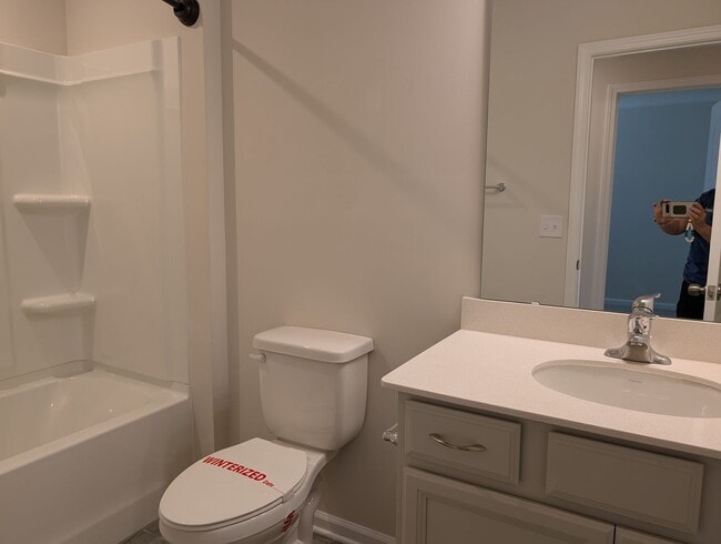 Building Photo - Elegant, Move In ready townhome located in...