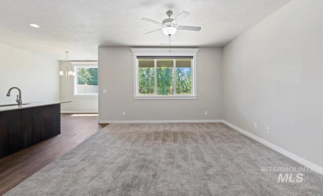 Building Photo - Stunning 4-Bedroom Home with Privacy & Low-Maintenance Living in Verado