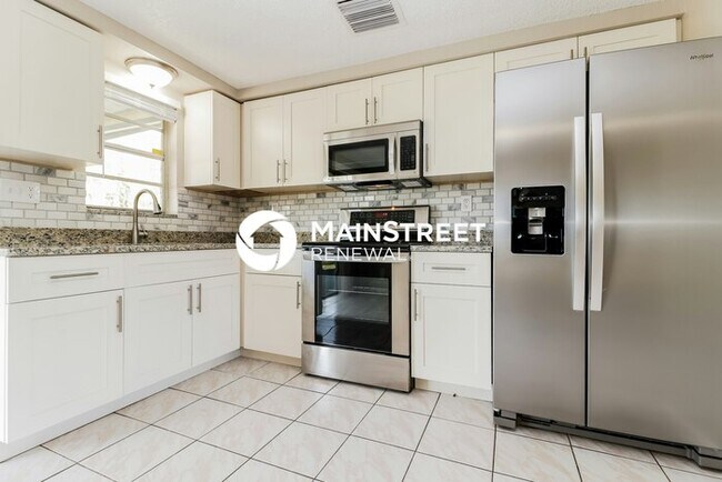 Building Photo - 3 Bedroom Pet-Friendly Home in HOLIDAY, FL with Main Street Renewal