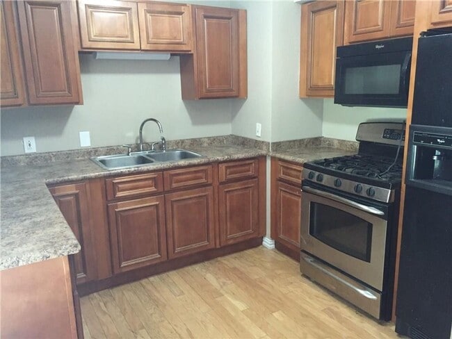 Building Photo - Remodeled 1 story home in Hurst with original plank wood flooring