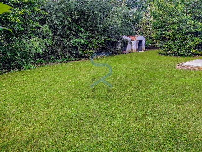 Building Photo - Move in before December 15th and choose your reward: a $250 Amazon Gift Card or a 55" Smart TV!