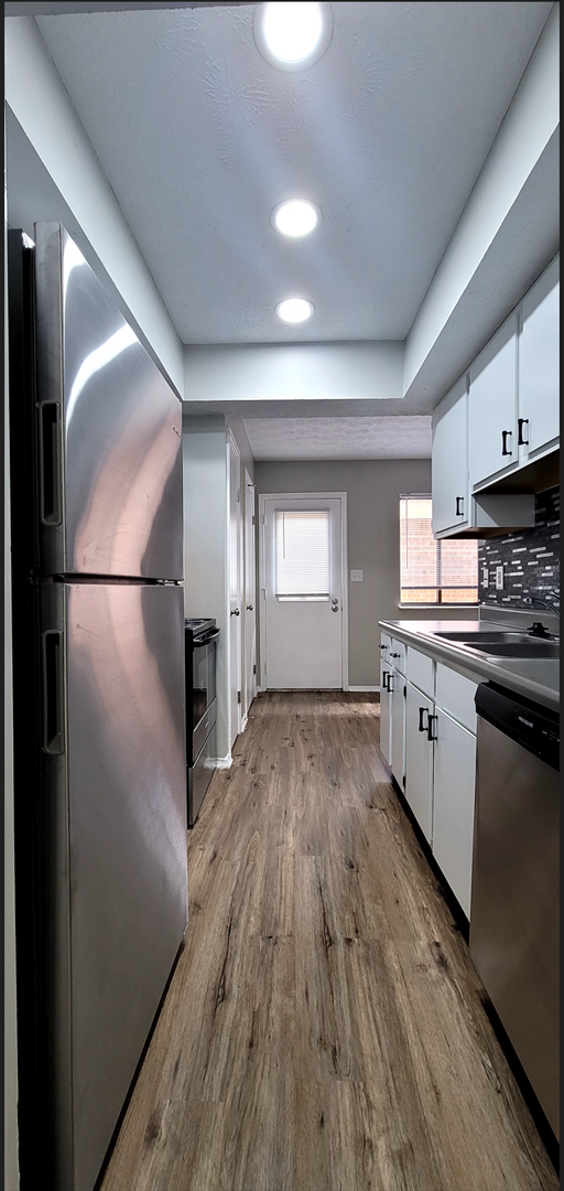 Building Photo - Beautiful 2 bedroom 1.5 bath Condo with at...