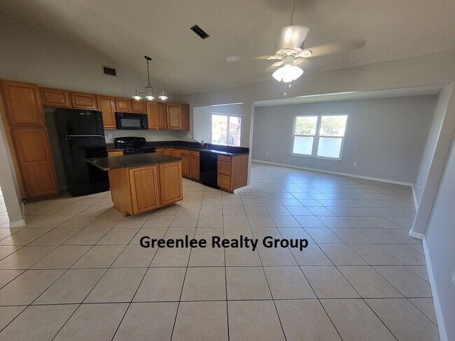 Building Photo - Relax by the water in this spacious 2-bedroom home with a 2-car garage, nestled in the highly des...