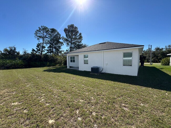 Building Photo - $500 OFF OF A MONTH OF RENT! Beautiful 4BD/2BA Home in Poinciana – No HOA Approval Needed! Pets W...