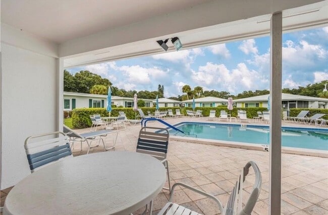 Building Photo - 55+Community - ANNUAL  1/1 GREAT LOCATION - UPDATED UNIT WITH COMMUNITY HEATED POOL!