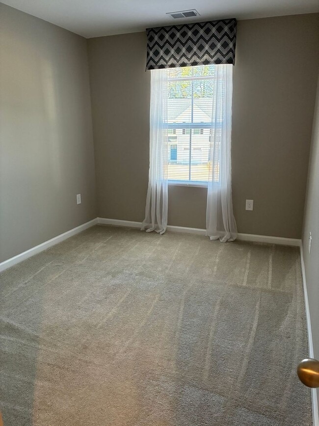 Building Photo - FORMER MODEL townhome at Villa Grande community