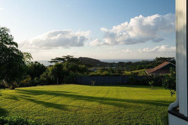 Building Photo - Elevated Haiku Retreat with Ocean Views, Designer Finishes & a Lush Edible Garden Sanctuary