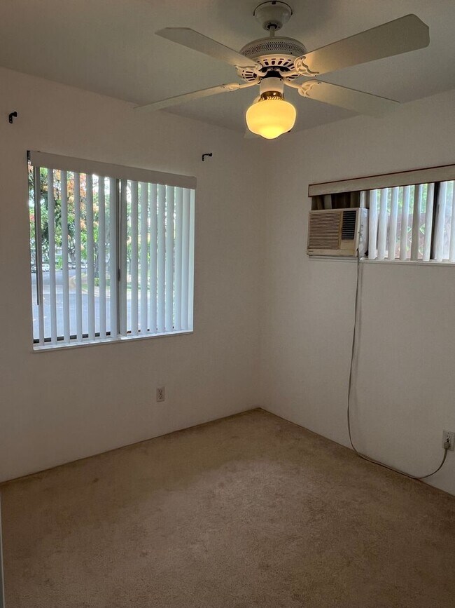 Building Photo - Kulalani Village in Kapolei - 2 Bedroom 1.5 Bath 2 Parking Townhome Unit