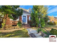 Building Photo - Charming Renovated Brick Cape Cod In Estab...