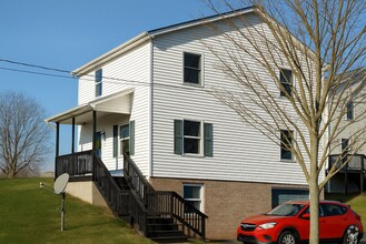 Building Photo - For Rent: 4-bedroom 2-bathroom single fami...