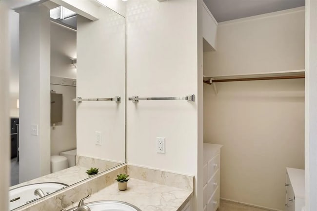 Building Photo - Spacious 1,550 Sq Ft Townhome | 2-Car Garage & High Ceilings w/ Exposed Beams