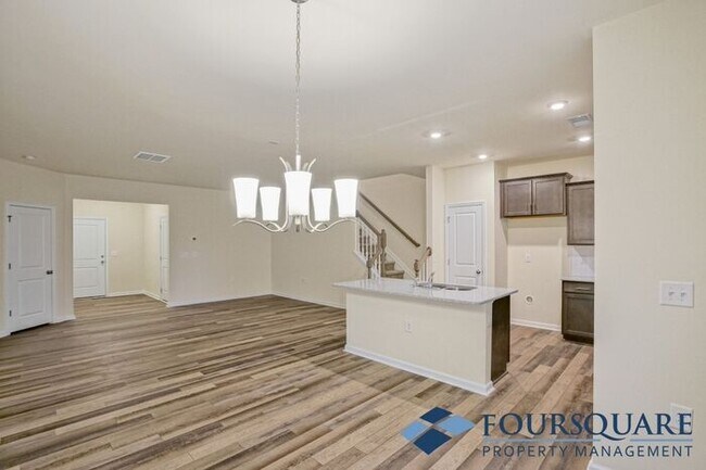 Building Photo - Spacious 3-Bed End- Unit Townhome with Mod...